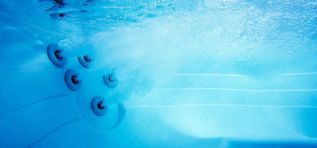 Underwater shot of a cloudy hot tub.